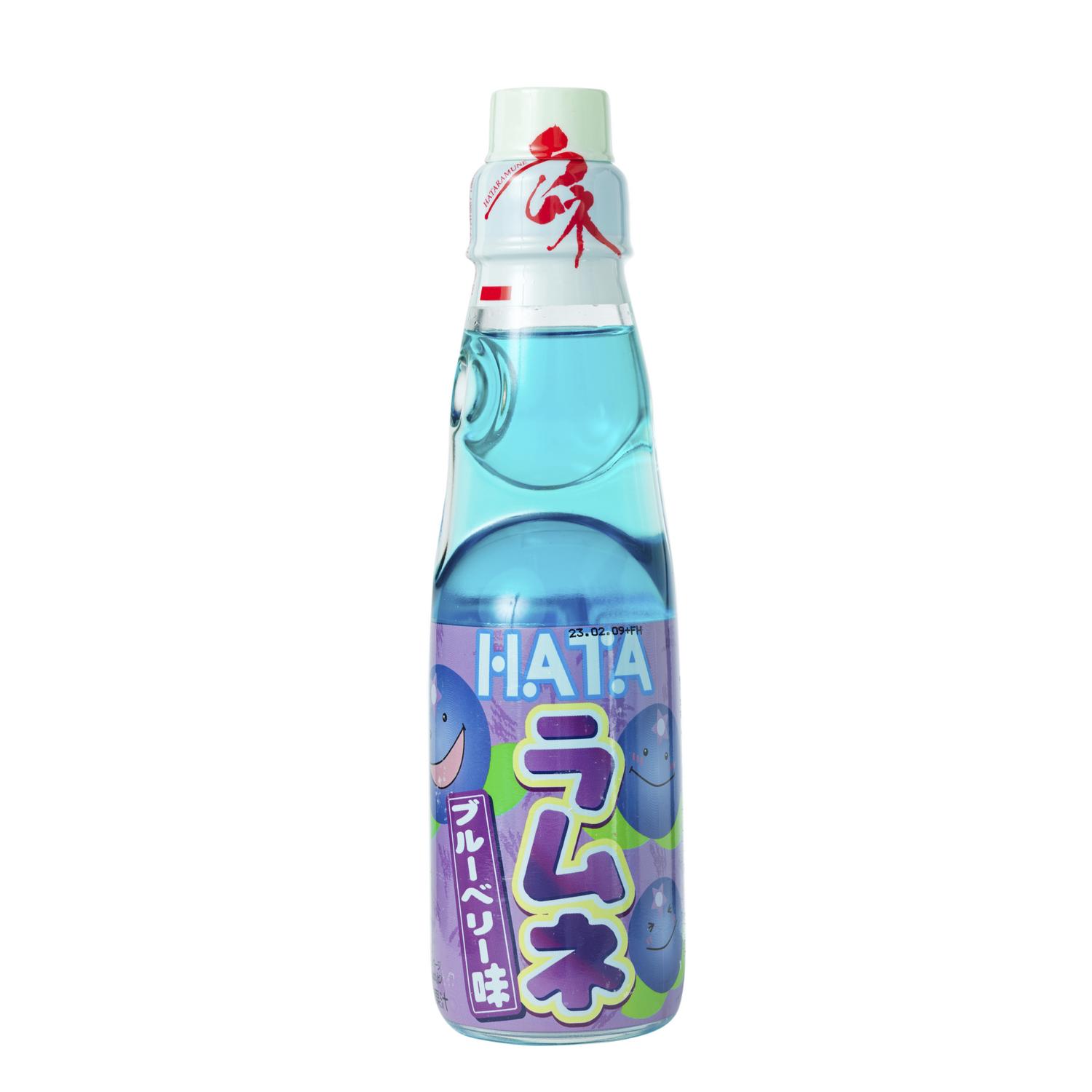 A bottle of Hatakosen Ramune Blueberry drink with a visible blue liquid and blueberries on the label.