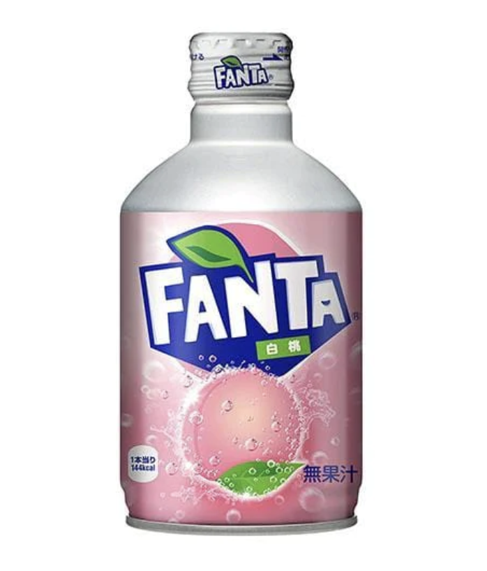 A can of FANTA White Peach flavored soda with a pink and white design, featuring an image of a white peach.